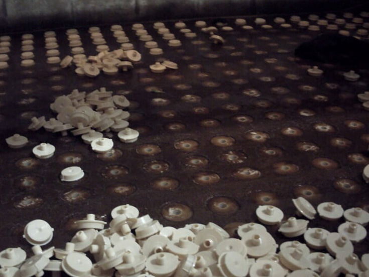 Flexkleen nozzles being installed on filter media